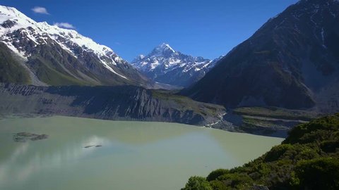 Mt Cook, New Zealand - Aerial view by drone flying over Hooker valley track, in Aoraki Mt Cook National Park.