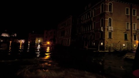 Water walk of walk on Grand Canal vaporetto at night from Saint Marco Square to Rialto in Venice, Italy