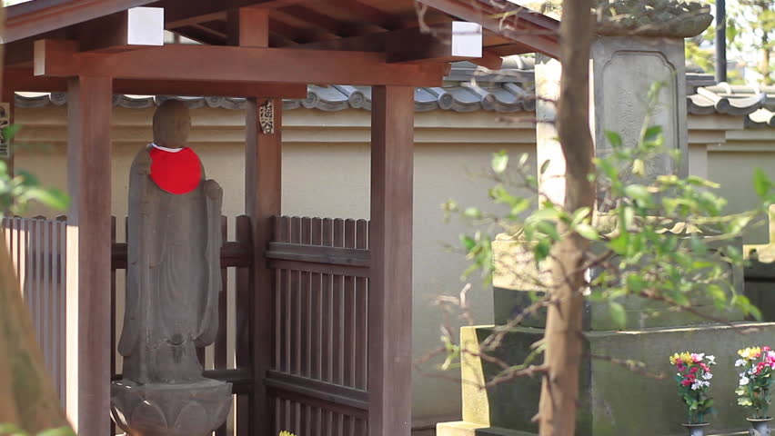 sculpture guardian angel  full shot right side at Aizenin temple in Nerima 2017.03.22 in Tokyo