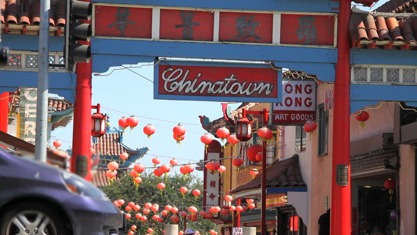 LOS ANGELES, CA - CIRCA 2012: Few tourists pass Chinatown sign circa 2012 in Los Angeles, California.