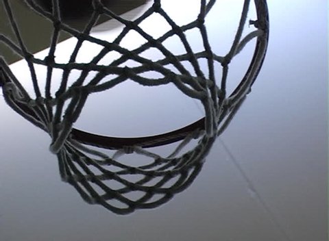 ball flies into the basketball hoop