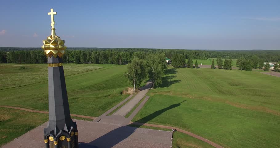 4K aerial video footage view of old beautiful 1812 war military memorial erected in 1912, road and fields area around it in Borodino near Moscow, capital of Russia in sunny summer morning