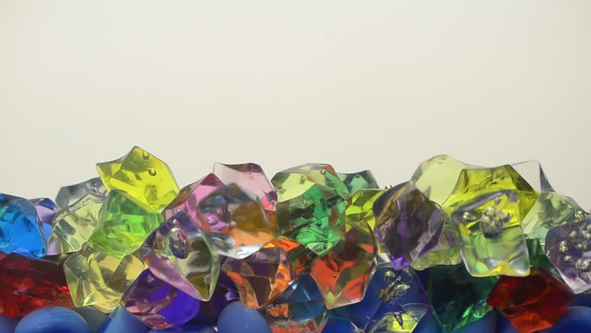 Multi-colored glasses in water.