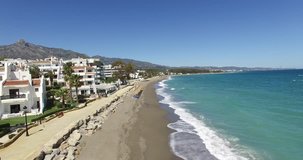 Marbella - one of the most fun, unbridled and freedom-loving beaches of Barcelona.  It is an ideal place for enjoying the sea and the sun. Video from the quadcopter.