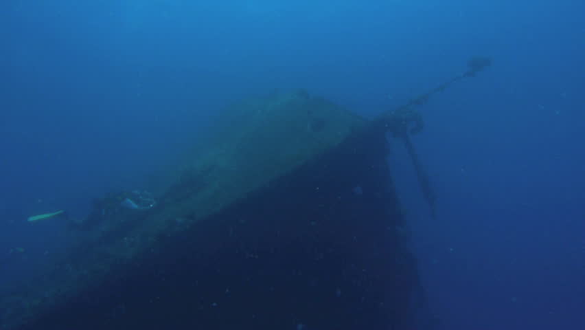 bow of shipwreck plus scuba diver