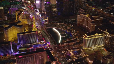 Las Vegas, Nevada circa-2017, Orbit Bellagio fountain and Las Vegas Strip at night. Shot with Cineflex and RED Epic-W Helium.