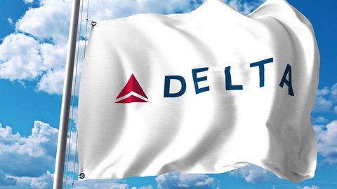 Waving flag with Delta Air Lines logo. 4K editorial clip