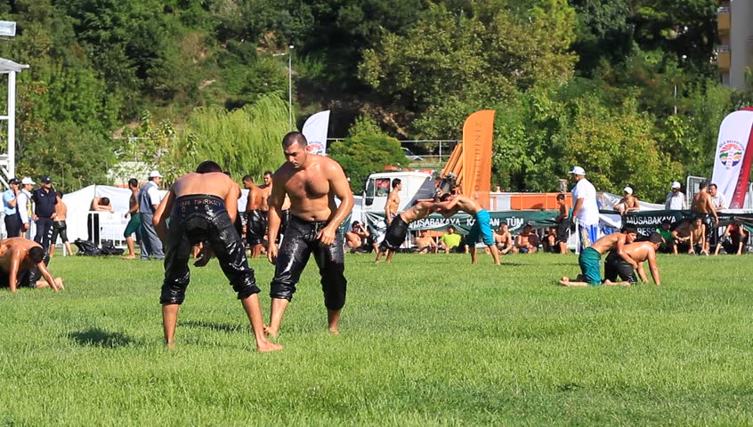 ISTANBUL - AUG 24: Unidentified wrestlers in the 8th Sile Annual Oil Wrestling