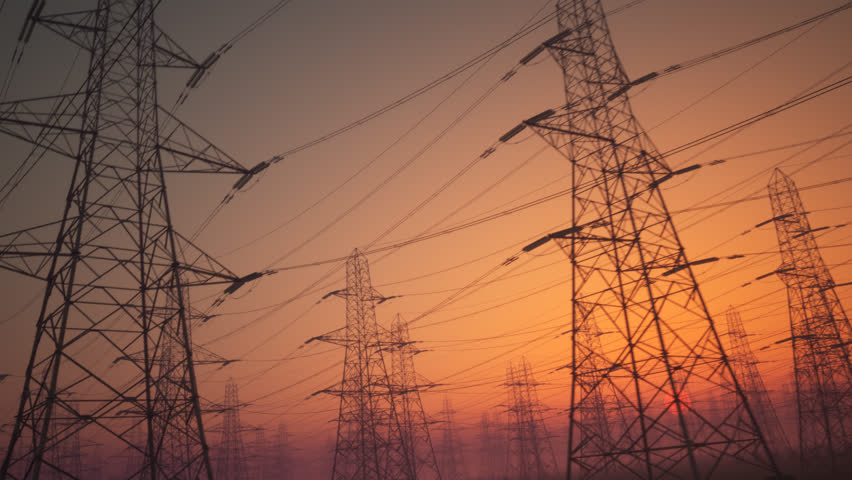 camera moving sideways looking at electricity pylons during sunset Royalty-Free Stock Footage #28494466