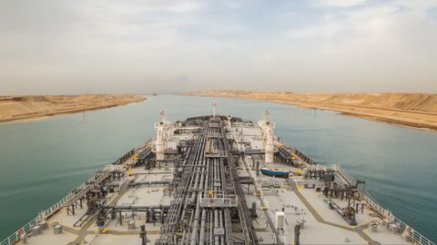 Oil tanker is proceeding through Suez Canal.