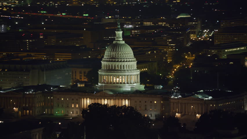 Washington, D.C. circa-2017, Aerial view of the United States Capitol building at night. Shot with Cineflex and RED Epic-W Helium. Royalty-Free Stock Footage #28498714