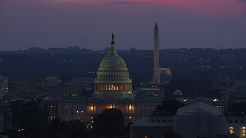 Washington, D.C. circa-2017, Aerial view of US Capitol Building at dusk. Shot with Cineflex and RED Epic-W Helium. Royalty-Free Stock Footage #28498732