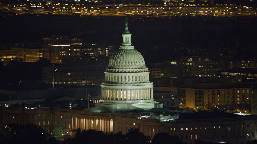 Washington, D.C. circa-2017, Aerial view of the United States Capitol building at night. Shot with Cineflex and RED Epic-W Helium. Royalty-Free Stock Footage #28498822