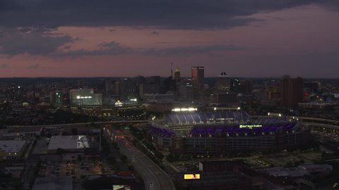Baltimore, Maryland circa-2017, Aerial view of M&T Bank Stadium and Orioles Park at dusk. Shot with Cineflex and RED Epic-W Helium.