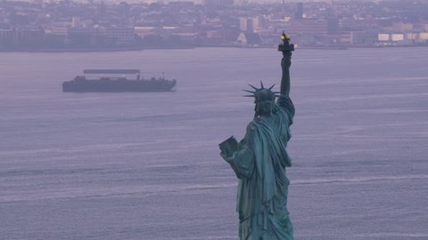 New York City circa-2017, Statue of Liberty on beautiful cloudy morning. Shot with Cineflex and RED Epic-W Helium.