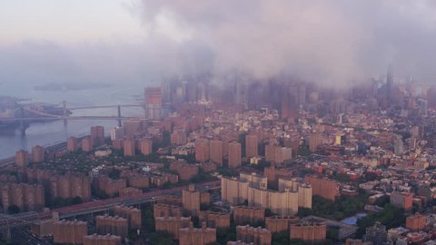 New York City circa-2017, Aerial view of low clouds over Manhattan and East River. Shot with Cineflex and RED Epic-W Helium.