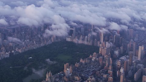 New York City circa-2017, Aerial view of Manhattan with low clouds at sunrise. Shot with Cineflex and RED Epic-W Helium.