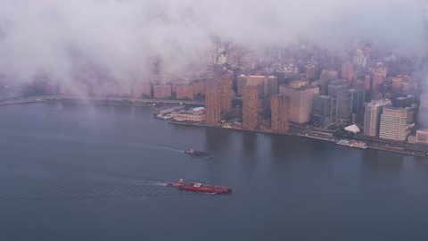 New York City circa-2017, Aerial view of barges on the Hudson River. Shot with Cineflex and RED Epic-W Helium.