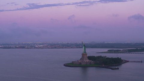 New York City circa-2017, Wide orbit of Statue of Liberty in early morning. Shot with Cineflex and RED Epic-W Helium.