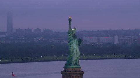 New York City circa-2017, Orbit Statue of Liberty to reveal Manhattan on foggy morning. Shot with Cineflex and RED Epic-W Helium.