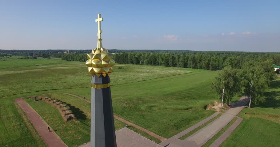 4K aerial video footage view of old beautiful 1812 war military memorial erected in 1912, road and fields area around it in Borodino near Moscow, capital of Russia in sunny summer morning