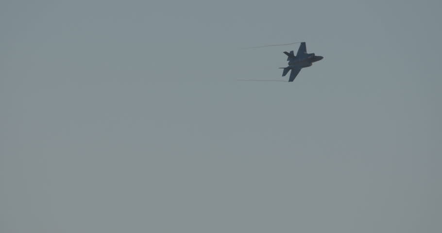 Israeli Air force stealth fighter flying and maneuvering during an airshow 