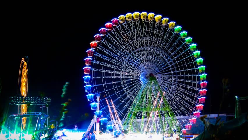 Time lapse (zoom in) of a carnival at night circa 2012 in Leon, Spain.