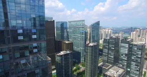 aerial view of drone flying over beautiful new modern Chengdu City with many high office buildings
