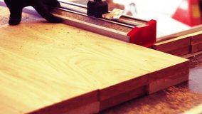 carpenter job: cut parts for furniture. flakeboard cutting. flakeboard production. chipboard factory