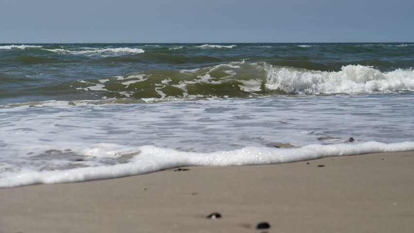 Breaking waves at a beach in super slow motion | Shutterstock HD Video #28526569