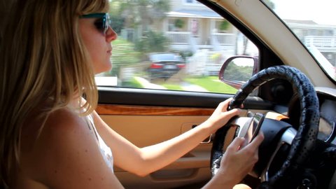 Young Woman Texting While Driving