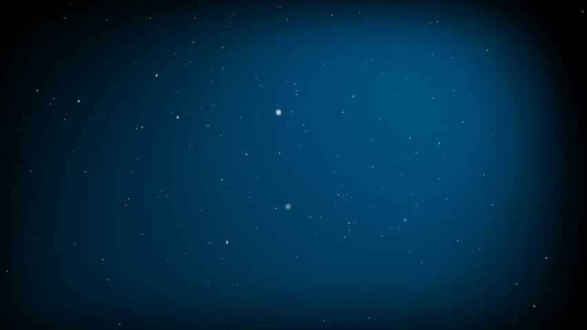 Snow gently falls over a blue background with a spotlight.