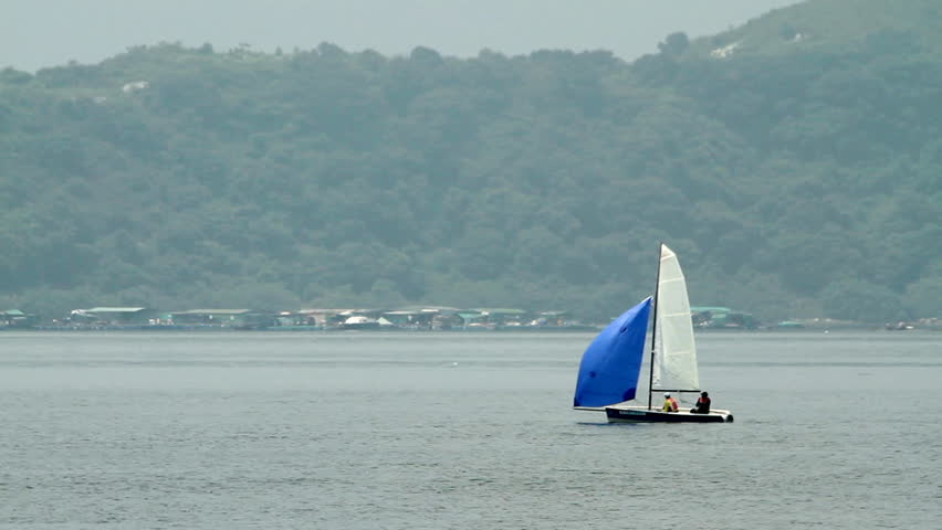 Sailboat with blue spinnaker - Hong Kong.