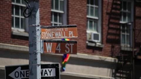 Stonewall Place street sign of historic location in New York City on a sunny day.