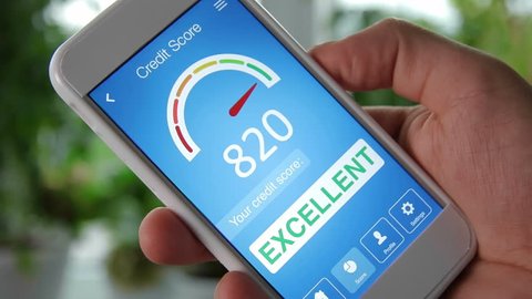 Checking credit score on smartphone using application. The result is EXCELLENT