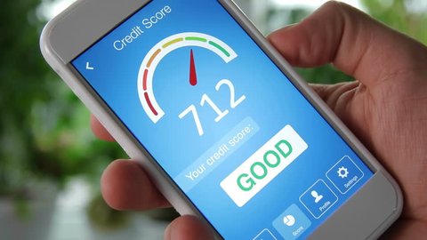 Checking credit score on smartphone using application. The result is GOOD