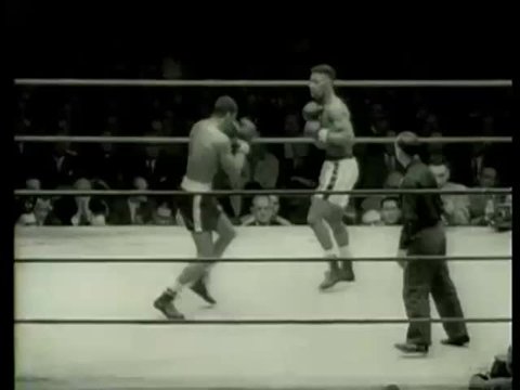 Kent Green from Chicago and Loomis Oglesby of Kansas City, MO, fight at Golden Gloves final heavyweight match in Chicago circa 1958-MGM PICTURES, UNIVERSAL-INTERNATIONAL NEWSREEL, USA, filmed in 1958