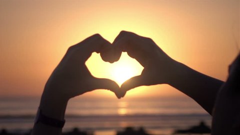 High quality video of symbol of love at the sunset in real 1080p slow motion 250fps