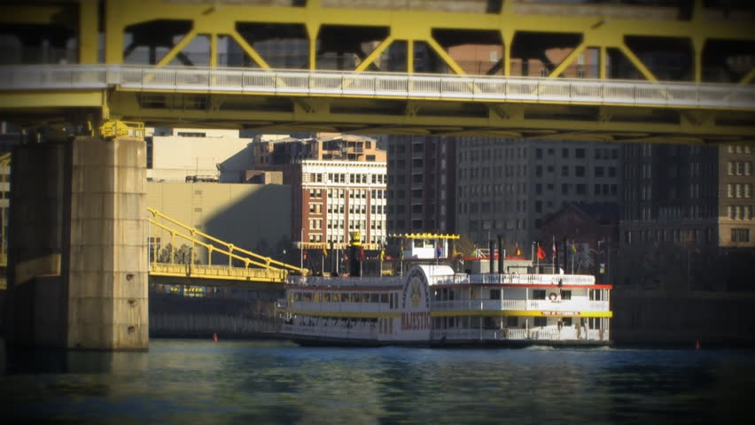 The Gateway Clipper riverboat travels under the Fort Duquesne bridge.