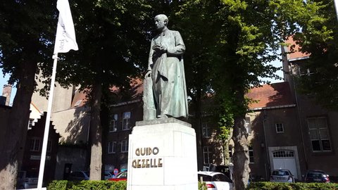 BELGIUM - CIRCA JULY 2016 - Guido Gezelle monument statue, old city Bruges, Belgium