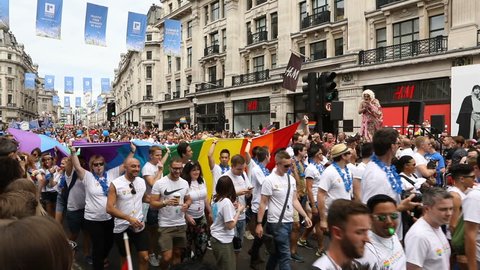 Flags and crow Pride in London Parade 2017 July 8 on Oxford Circus and Regent Street.   Series of  Reportage photo from gay parade. Video footage 