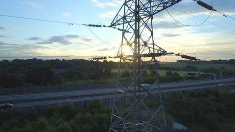 Close Aerial View of an Electricity Pylon at Sunset