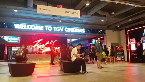 KUALA LUMPUR, MALAYSIA, JULY 8, 2017 : Timelapse footage people crowd in front of counter of TGV cinema.