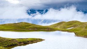 A look at the main Caucasus ridge and Koruldi lake. Location Mestia, Upper Svaneti, Georgia country, Europe. Explore the world's beauty. Time lapse clip, interval shooting in HD 1080 video.