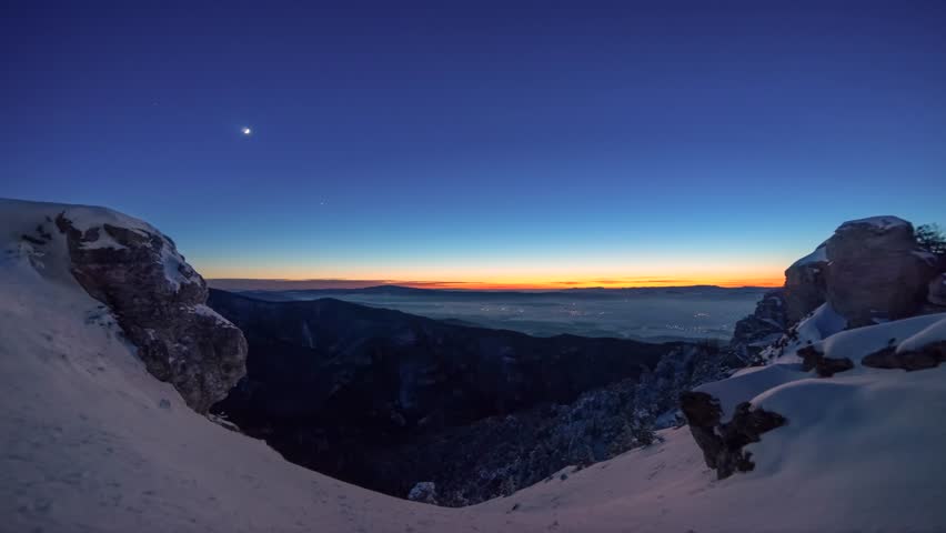 The transition from day to night, timelapse from the white bottom to the dark night with the starry sky
