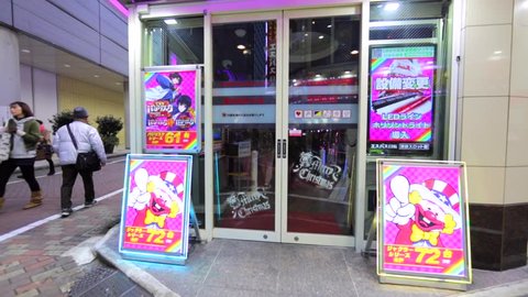 TOKYO, JAPAN - DECEMBER 12, 2016: Entering store of simulators and view of paying people. Shibuya district.