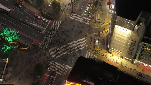 Japan Tokyo Aerial v20 Vertical birdseye view flying low over famous Shibuya intersection crossing night 2/17