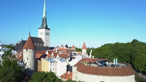 Crane shot of Fat Margaret tower and wall around Tallinn Estonia old town