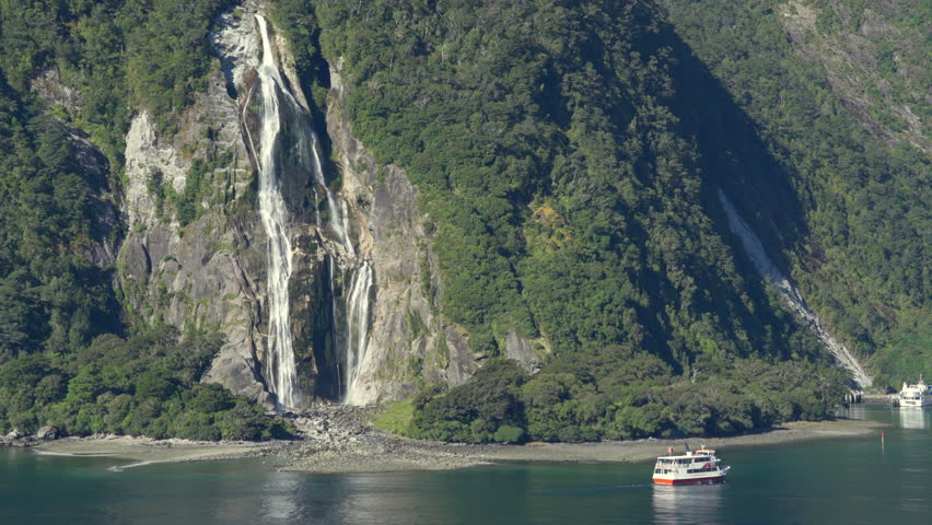 Stunning landscape of New Zealand. Waterfall in Milford Sound