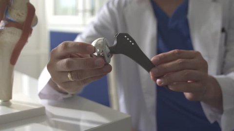 in the hands of doctors implant the hip joint